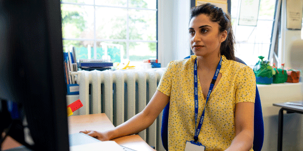 Teacher at Computer