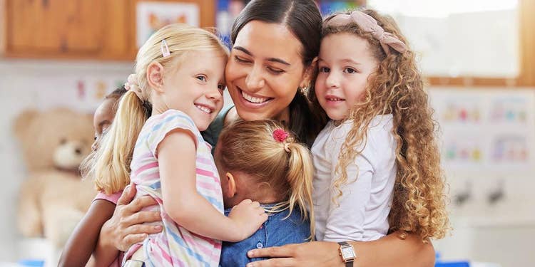 Teacher Hugging Girls